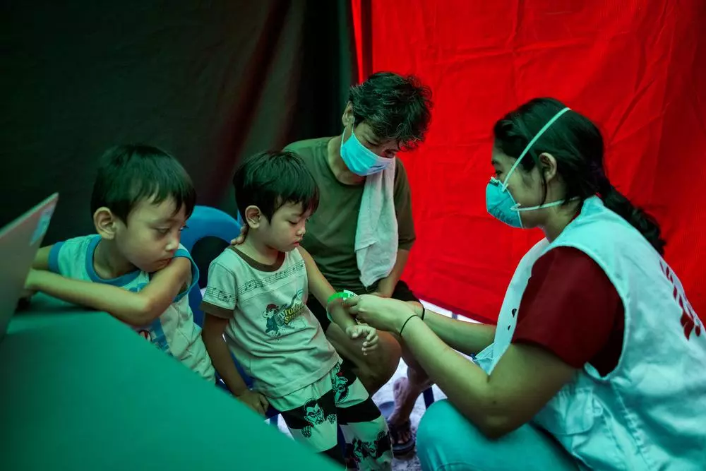Doctor examining child patient