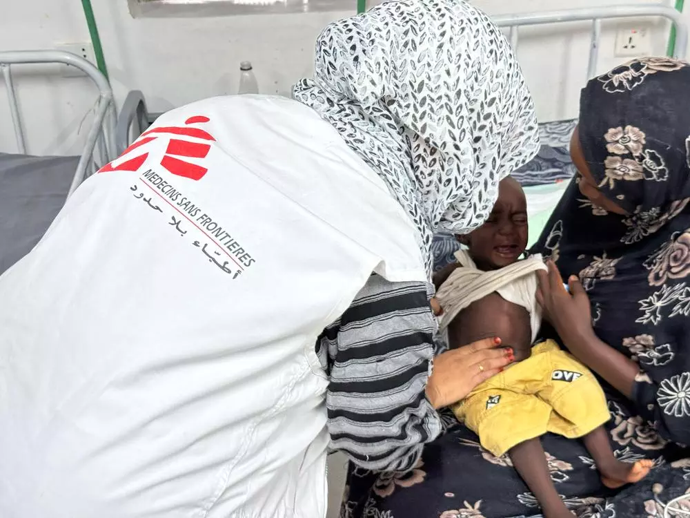 Doctor examines a child 