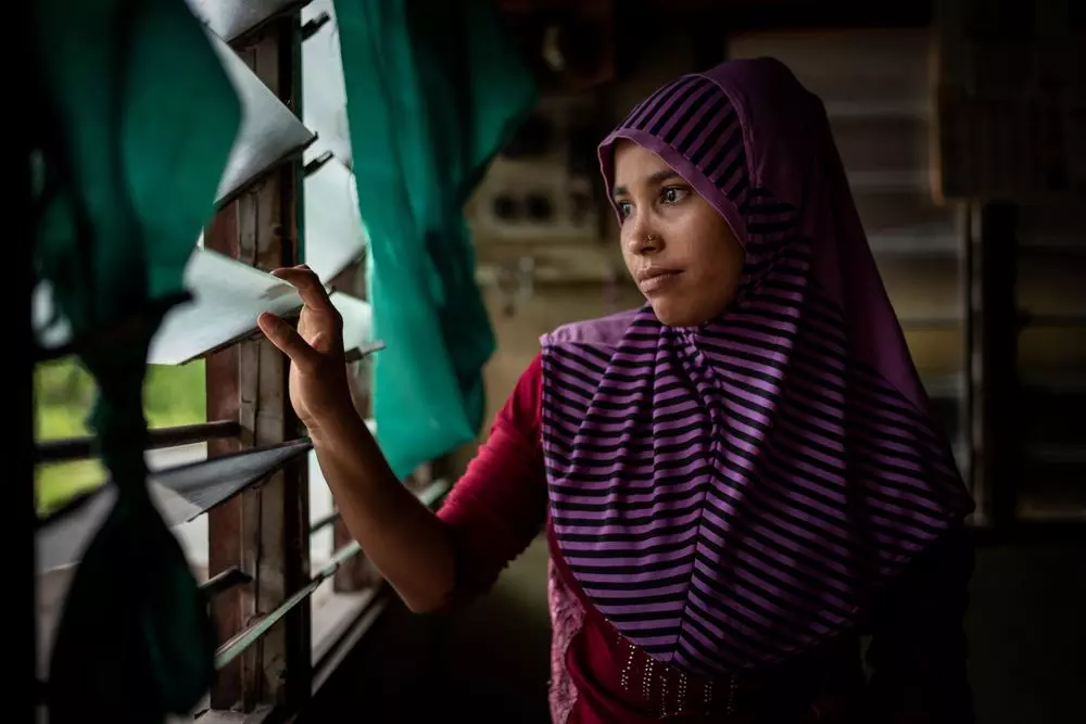 A woman looking out the window