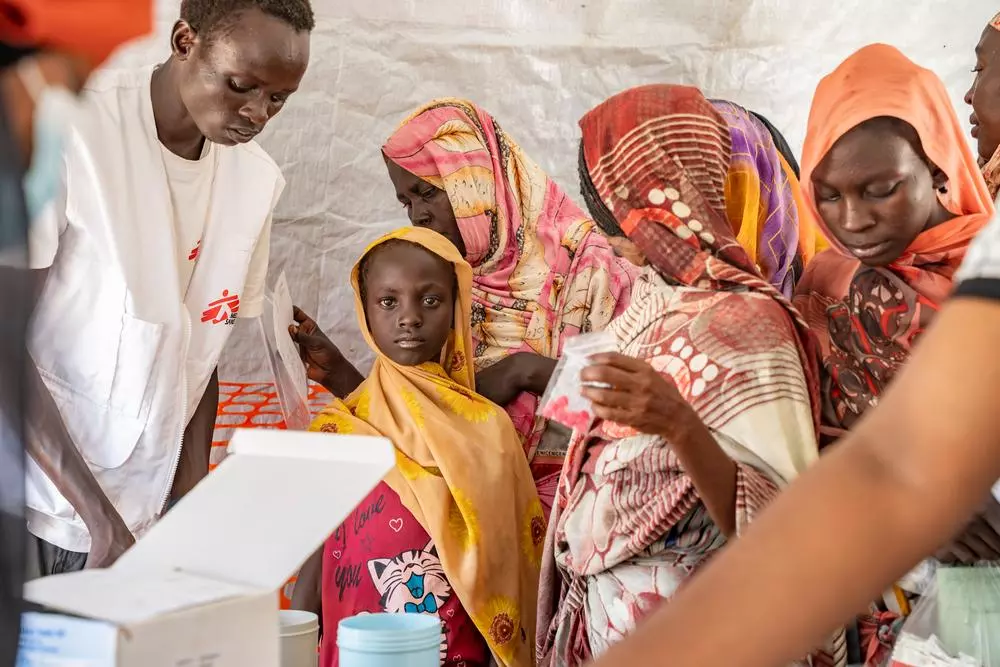 Patients at a mobile clinic in Atam run by MSF for refugees fleeing war in Sudan. 