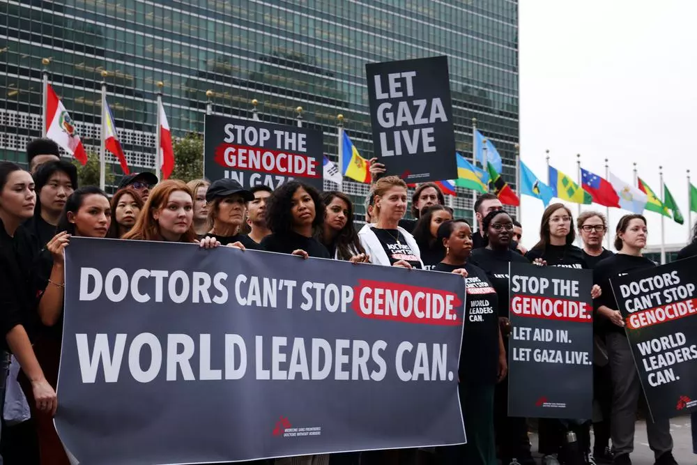MSF staff and supporters gather in front of the UN Headquarters in New York to call on world leaders to take action and end the genocide in Gaza
