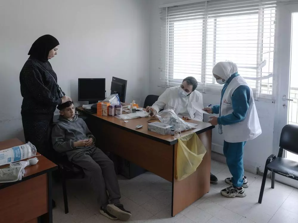 MSF staff and patient