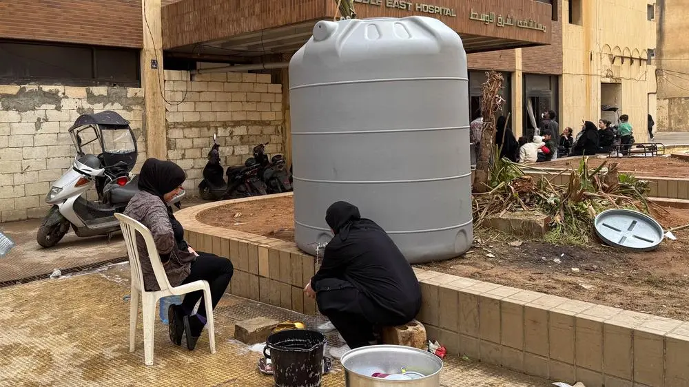 Women at a water tank